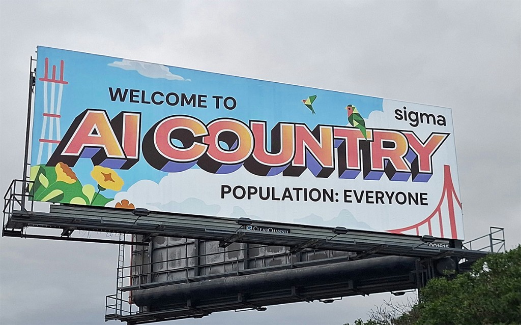 Billboard reading 'Welcome to AI Country. Population: Everyone.'